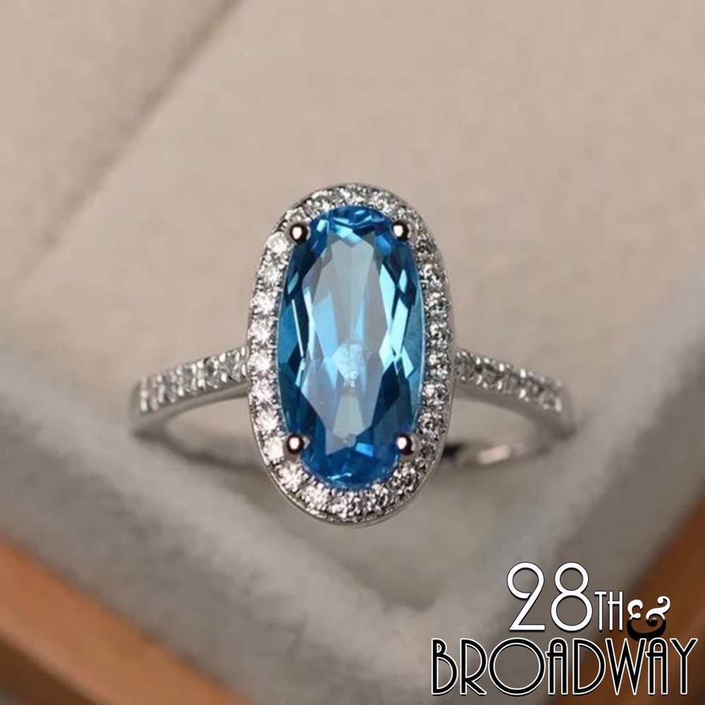 18K White Gold Long Blue Oval Diamond Ring
